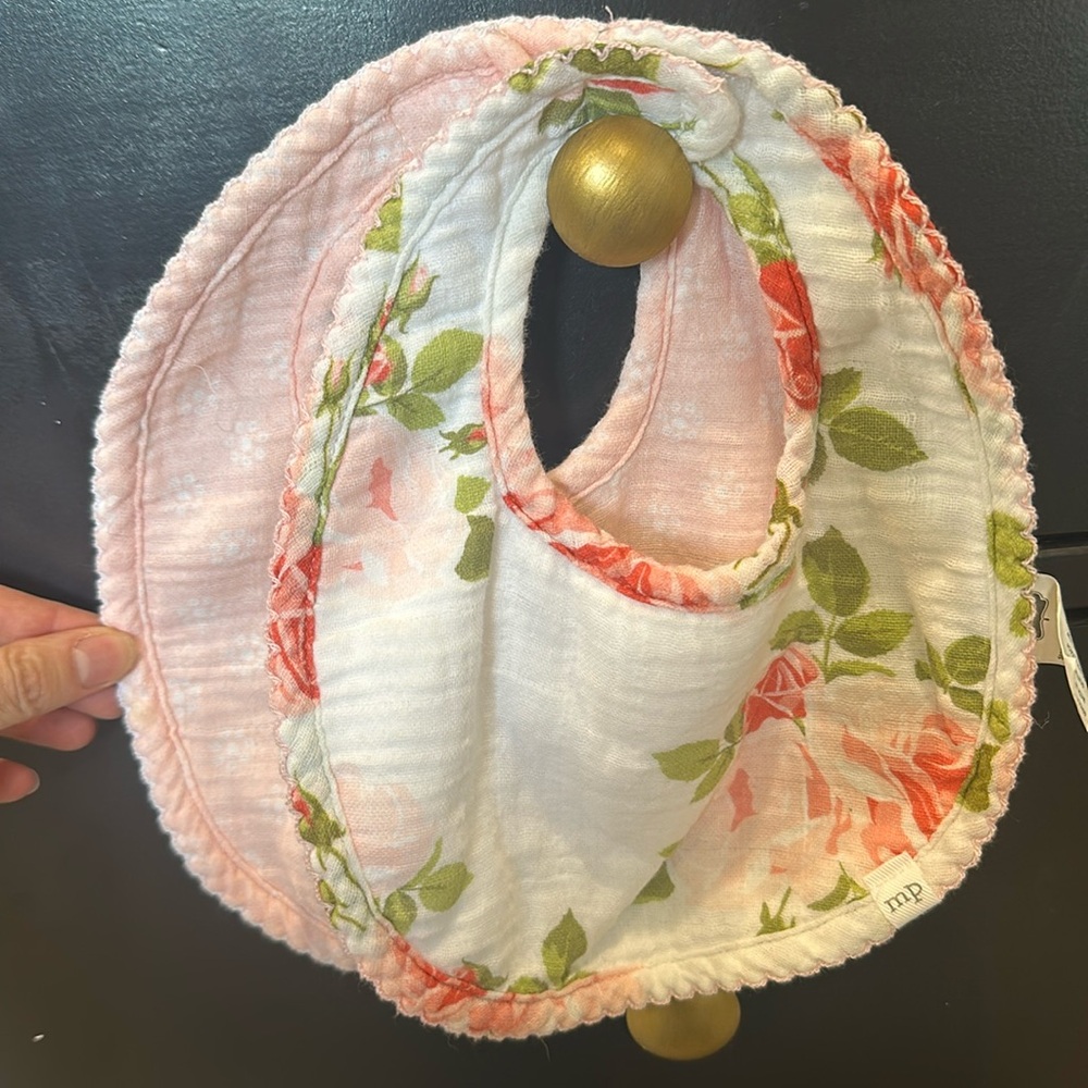 NWOT MUD PIE bibs. Floral and pink prints